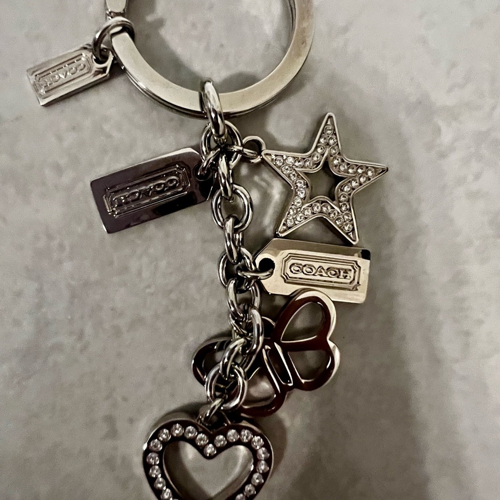 Coach Silver Keychain with Heart, Star, and Butterfly Charms